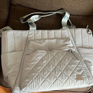 Medium sized blue Steve Madden tote